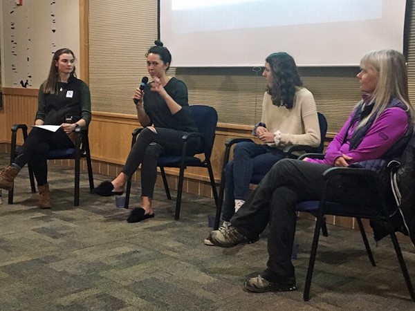SCA intern Sabrina Farmer (far left) moderated a panel discussion before the start of the No Man's Land Film Festival.