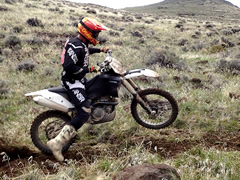 Motorcycle Racer at the Dry Valley Off-Highway Vehicle Area near Susanille, CA.  Photo by Marisa Williams, BLM.