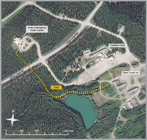 Location map of the Arctic Interagency Visitor Center in proximity to the Dalton Hiway and other businesses across the highway. Shows the route of the new walking trail between the two areas of facilities as well.