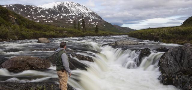 Angler standing at Delta Wild and Scenic River falls