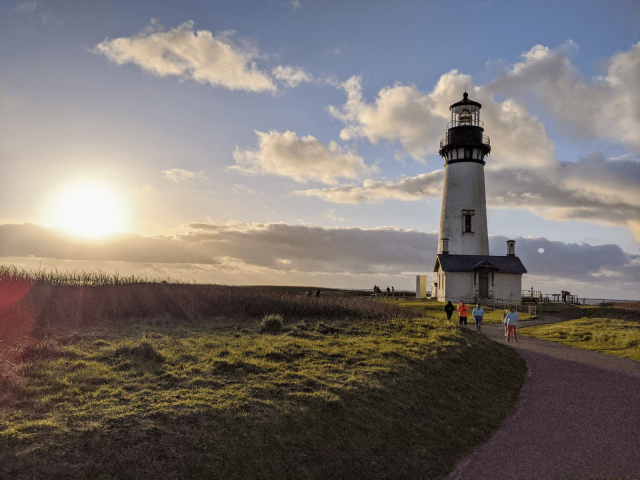 Children enjoy the last moments of sunshine at Yaquina Head Outstanding Natural Area, Feb. 16, 2020. Photo by Meredith Matherly
