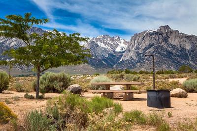 A campsite in the shadow of a mountain. Photo by Jesse Pluim, BLM.