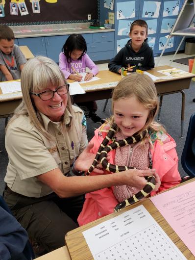 Ranger Tammy and Kolbie&nbsp;the California Kingsnake visit all the classes participating in the program. Students learn why we don't take animals from the wild, not to release pets into the wild, and that we don't have to kill animals that we are afraid of.&nbsp;