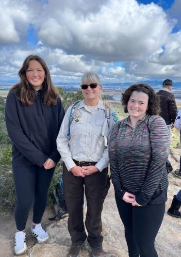 Ranger Tammy is pictured with two high school students, Katlyn Kimball and Lily Lapham, they were students that went through the Junior Ranger Program in the 3rd&nbsp;grade at Toro Park Elementary school. They have returned this year to assist Ranger Tammy with the Saturday hikes.&nbsp;
