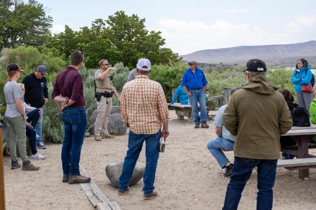Members of the Idaho Resource Advisory Council receive outdoor briefing on BLM land.