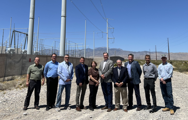 Acting Deputy Secretary of the Interior Laura Daniel-Davis (center) stands with BLM Nevada State Director John Raby (left of her) and NV Energy CEO Doug Cannon (right of her) with members of their respective staffs stand for a group photo next to a NV Energy substation outside Las Vegas, Nevada.