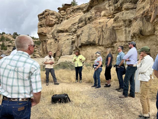 Betsy Chapoose talks with a group at Canyon Pintado in September 2023.