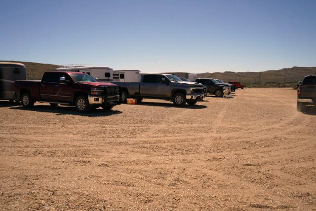 Bear Creek parking lot with trucks and horse trailers lined up