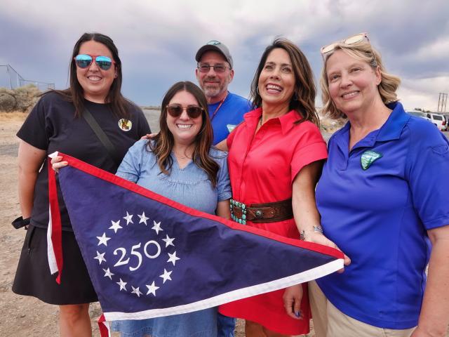 BLM and others holding the flag