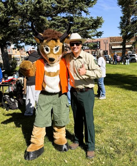 Smokey Bear, left, and the BLM’s Seymour the Antelope pose for a photo during Kemmerer Outdoor Discovery Day at Triangle Park