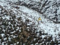 Olathe Spray Service aircraft distributes seed on the Bull Draw fire burn area