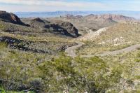 A winding road passes through mountains