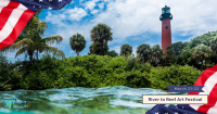 A vibrant scene showcasing a lighthouse surrounded by trees, with water in the foreground, promoting the River to Reef Art Festival on March 21-22.