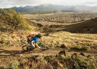 Bike rider on the Salida trail on the ridge above Salida, CO.