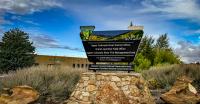 Photo of official BLM Colorado building sign in front of Grand Junction Field Office
