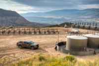 BLM staff checking tanks on an oil and gas development site on public land in Colorado.