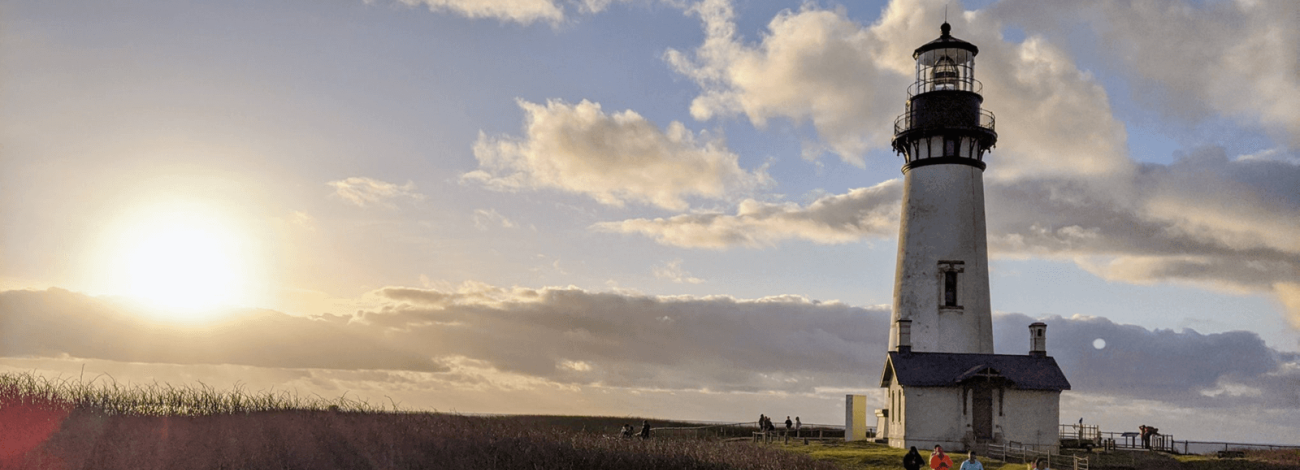 Children enjoy the last moments of sunshine at Yaquina Head Outstanding Natural Area, Feb. 16, 2020. Photo by Meredith Matherly