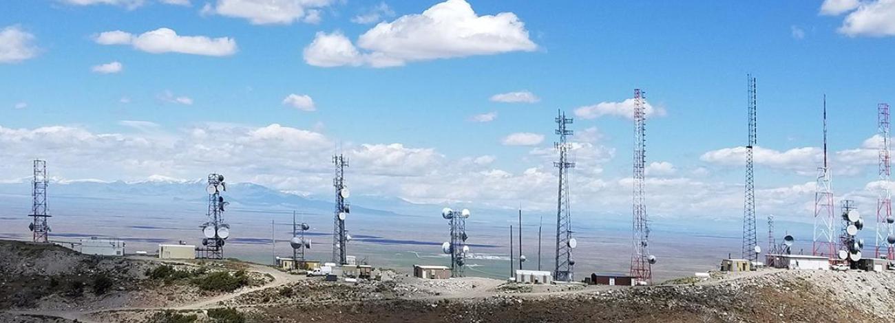Communication towers on a hilltop right of way on public land