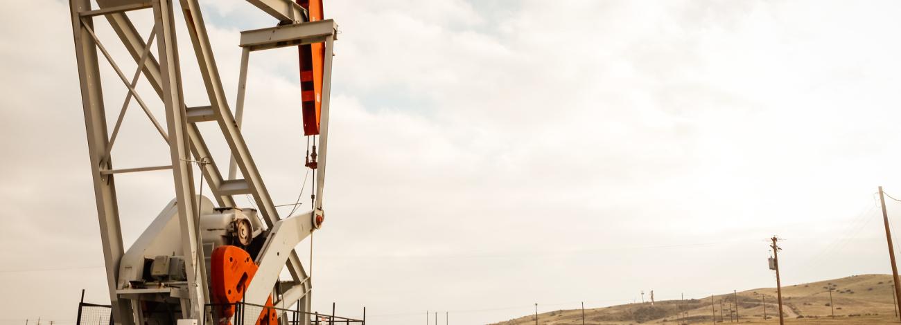 Bakersfield Field Office oil derrick in a dusty area