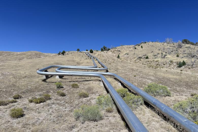 Geothermal powerplant pipes crossing over Utahs West Desert