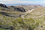 A winding road passes through mountains