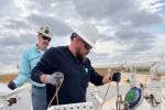 Students at PET Module 4 Oil Measurement gauge an oil storage tank to determine the quantity and quality of the oil in the tank.