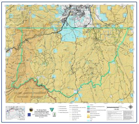 A detailed travel management area map of the St. George Basin in the northwestern Arizona Strip. The Utah-Arizona state boundary crosses through the northern portion of the map. Named springs, peaks, canyons, and water tanks are labeled throughout the map. An inset locator map in the lower left shows the map area in regional context.