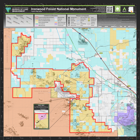 A detailed map of Ironwood Forest National Monument in Pima and Pinal counties. The monument boundary is shown with a solid red line. Named peaks, mountain ranges, and washes are labeled throughout the map. Recreation sites shown include the Ragged Top Trailhead, Waterman Trailhead, Waterman Group Site, and Silverbell Group Site. The Juan Bautista de Anza National Historic Trail is shown crossing the monument area.